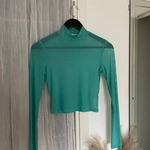 Transparent turkos tröja  - Tröja 