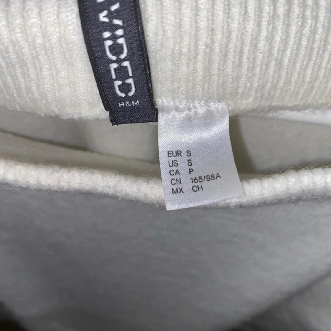 Stickad off-shoulder - 90