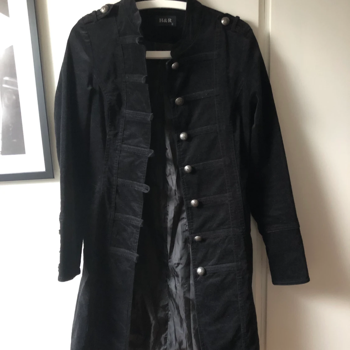 Kappa i band-jacket stil