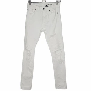 H&M Biker Jeans Skinny  - Vita, knappt använda jeans med snygga detaljer över låren. Modellen är Skinny och sitter tight över benen med en aning stretch. Byxorna är i storkek 30 och har inga skador. Säljer på grund av att de är för små. 
