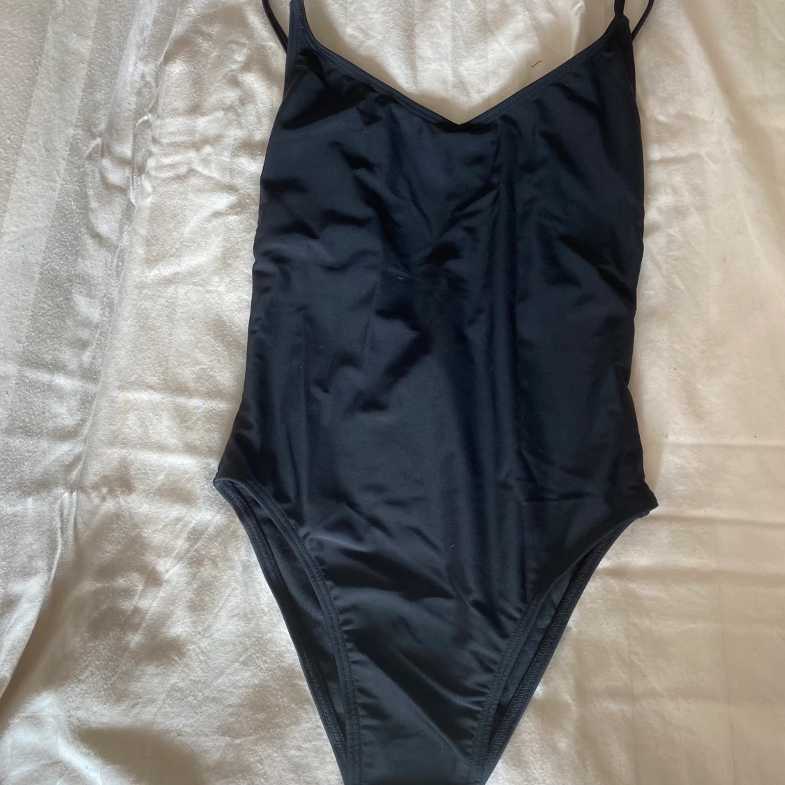 Oanvänd baddräkt stl XS