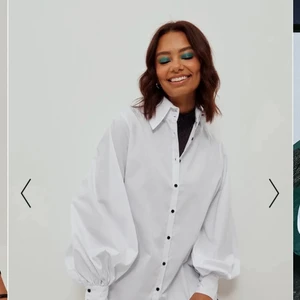 Skjorta med ballongärm - Helt oanvänd snygg skjorta från NA-KD. Säljs pga fel storlek.