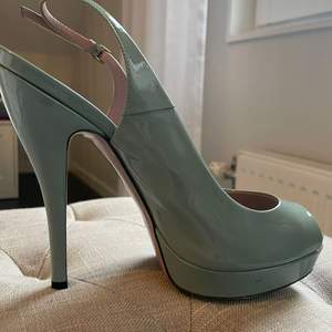 These are original Gucci heels and have been worn once to a wedding. They have minor marks and the bottom of the shoes is of course used. These come in original package and extra heel studs. Happy to send more photos if needed. 