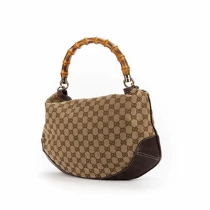 Gucci väska  - Säljer min vintage Gucci  Bamboo Canvas väska. Den är 38x289cm. Köpt från The Vintage Bar. Jag har äktehetsbevis. 