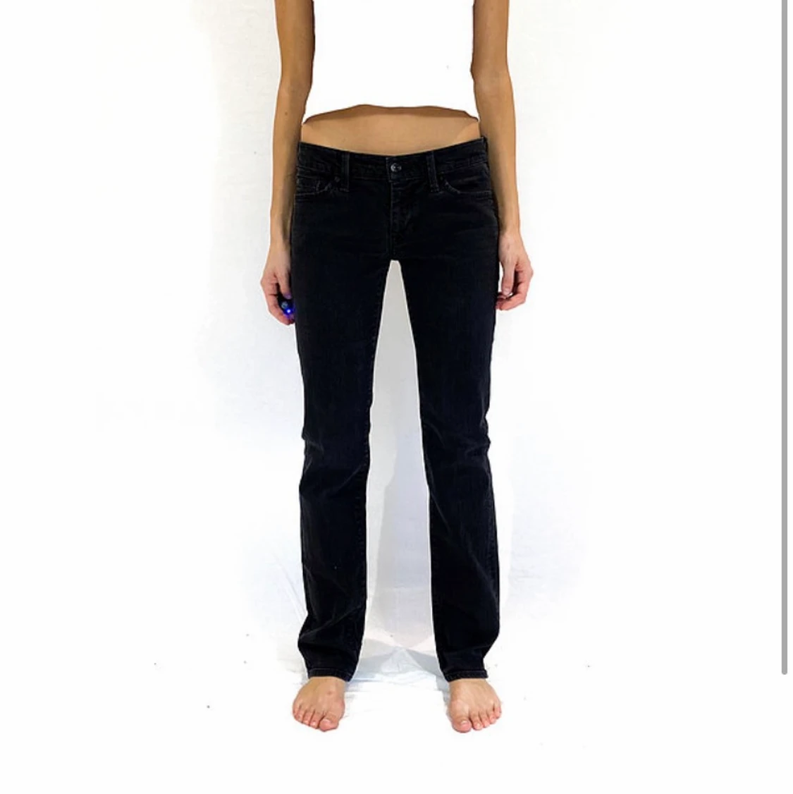 Svarta lågmidjade jeans