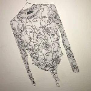 Mesh Faces Bodysuit  - Från UK