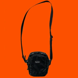 Supreme waist bag  - Used. A little pealing on the sides. 