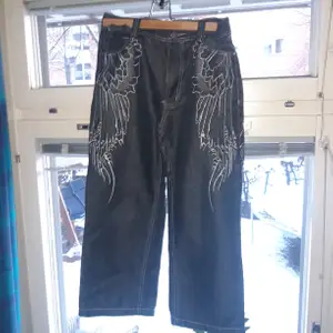 Angel wing looking jeans very cool