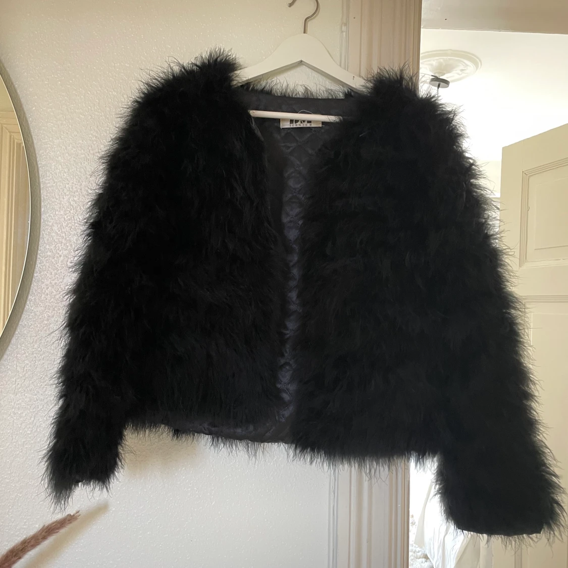 Svart strutsjacka från DM retro