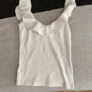 Topp  - Ett vitt linne i ett bra skick 