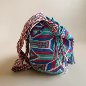 Vintage Colombian Mochila Drawstring - made in Colombia with colorful threads from Cotton & Aloe. Drawstring Closure with Fringed Tassels 30 CM/14 IN Length of Bag (not including Strap) 25 CM/11 IN Width 53 CM/ 20.9 IN Drop