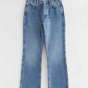 Bootcut jeans other stories - Helt nya och oanvända ljusblåa bootcut jeans med slits från other stories