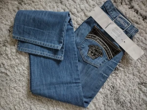 Versace jeans, dam st. 30 - Nya vintage Versace jeans, dam st. 30