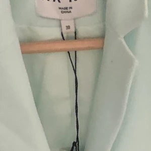 Prislappen sitter kvar, oanvänd  - Ny klänning från Naked