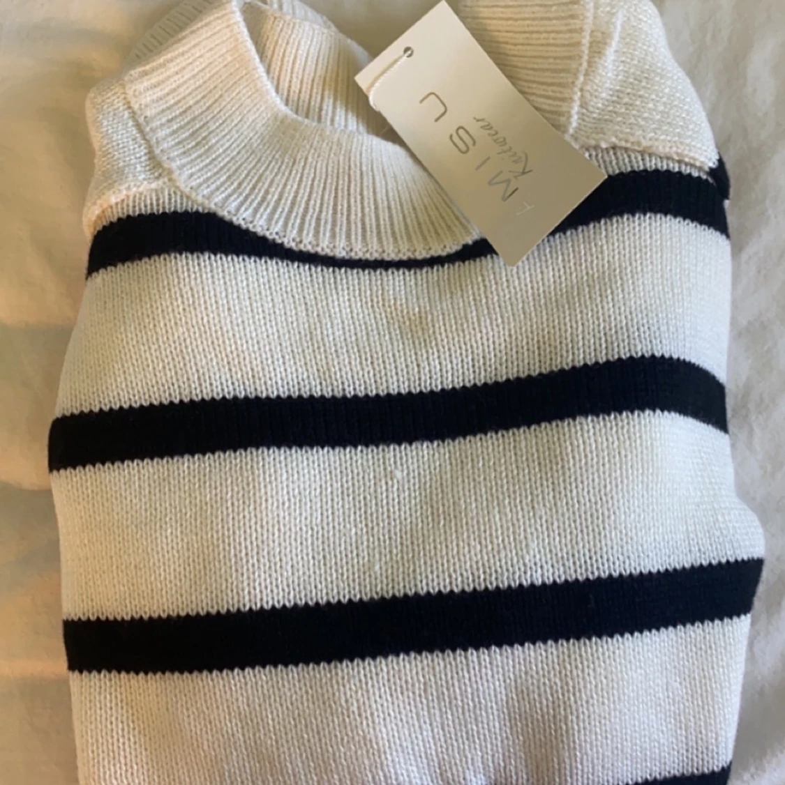 Trendigt stickad rutig tröja 