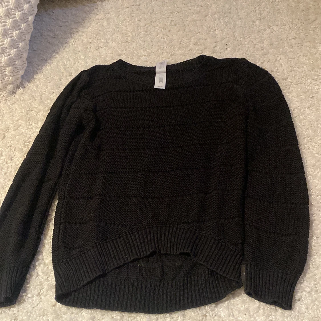 Randig svart stickad  - 91