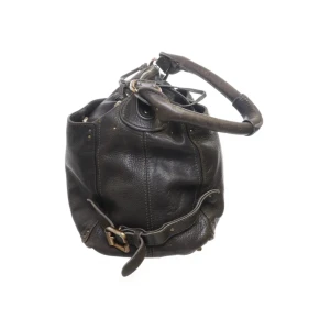 Chloeväska  - Chloeväska köpt på sellpy. Äkta  Den är brun/svart med gröna detaljer 