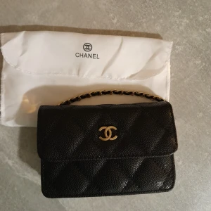 Wallet on chain - Mini woc i fint skick. Postar spårbart