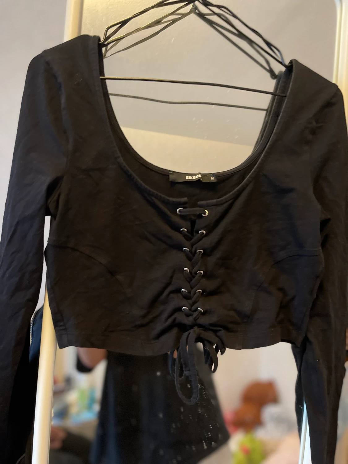 Svart toppa M