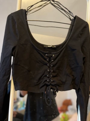 Svart toppa M - Svart toppa med stl M
