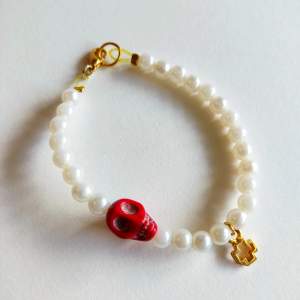 Handmade bracelet with pearl, scull and cross, new. 18-19 cm length 