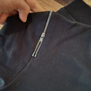 Saint Laurent size M slim black sweater - Original. Black soft loopback sweatshirt with silver zips. Size M slim. Great for women too. Condition very good.