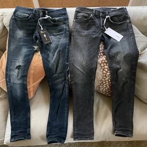 Dondup - Säljer 2 par Dondup George Jeans i Strolek 30. Mörkblå: Skick 5/10 (pga hål på vänsterbenet), Nypris 3000kr, Mitt pris 300kr. Gråa: Skick 7/10, Nypris 2000kr, Mitt pris 500kr