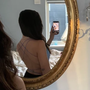 Topp - Söt babyblå topp från Tiger Mist med fin rygg, som tyvärr är för liten på mig så säljer. Står storlek S på lappen men jag skulle nog säga att den är mer XS.