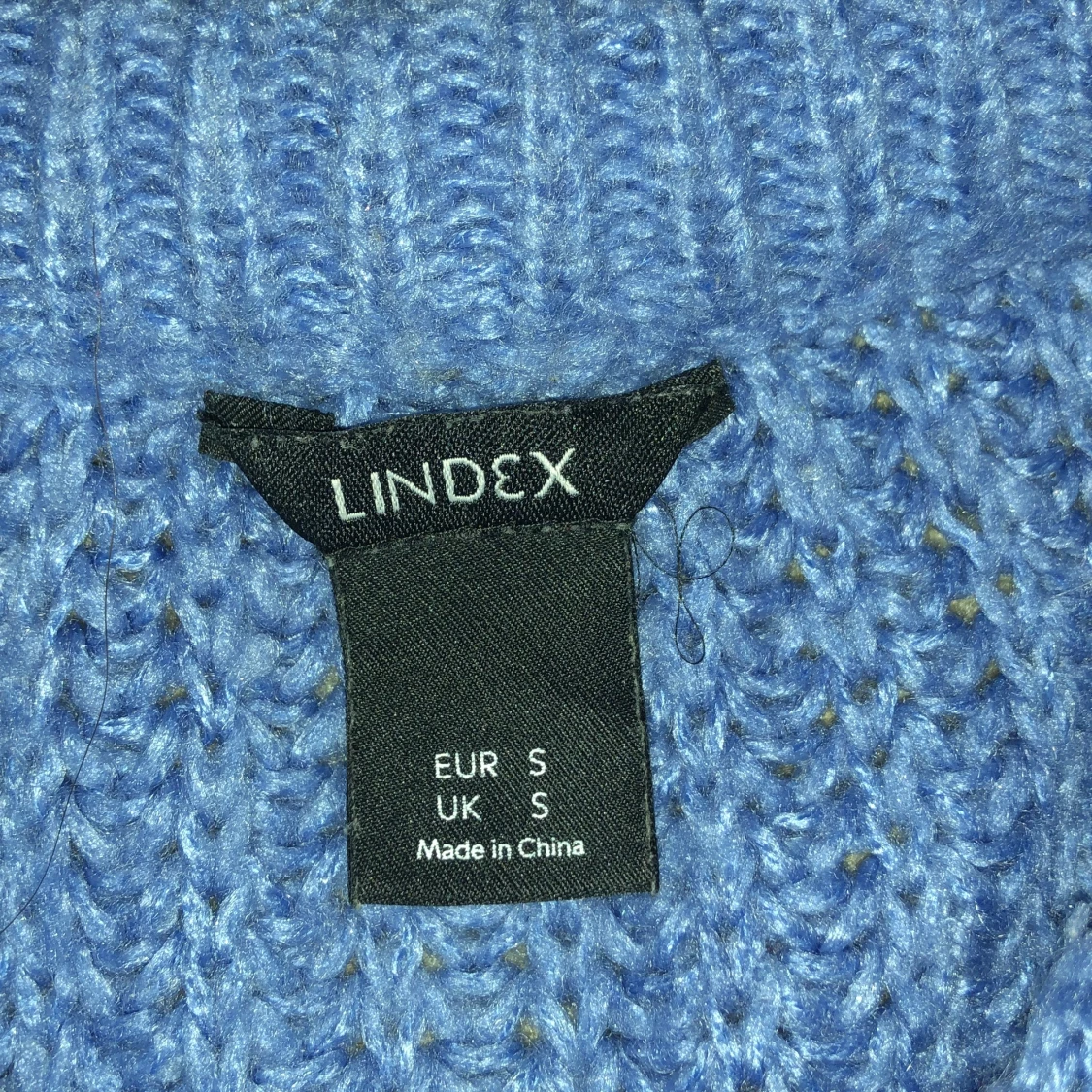 Blå stickadtröja - 91