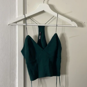 Grön topp - Grönt linne, aldrig använd i storlek xs. Linne från bok bok 