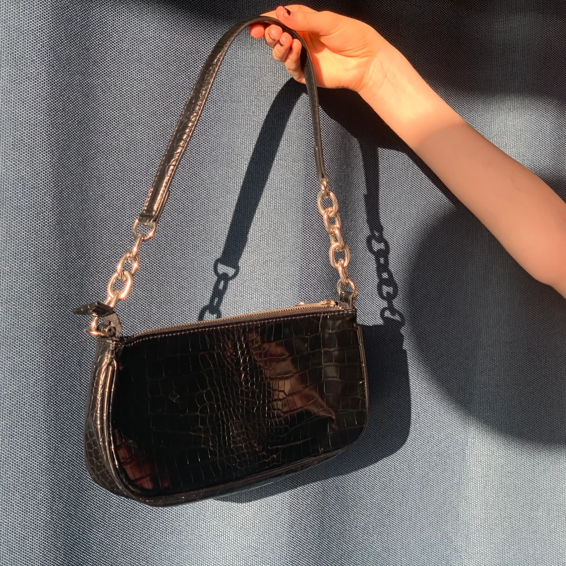 Väska med crocomönster