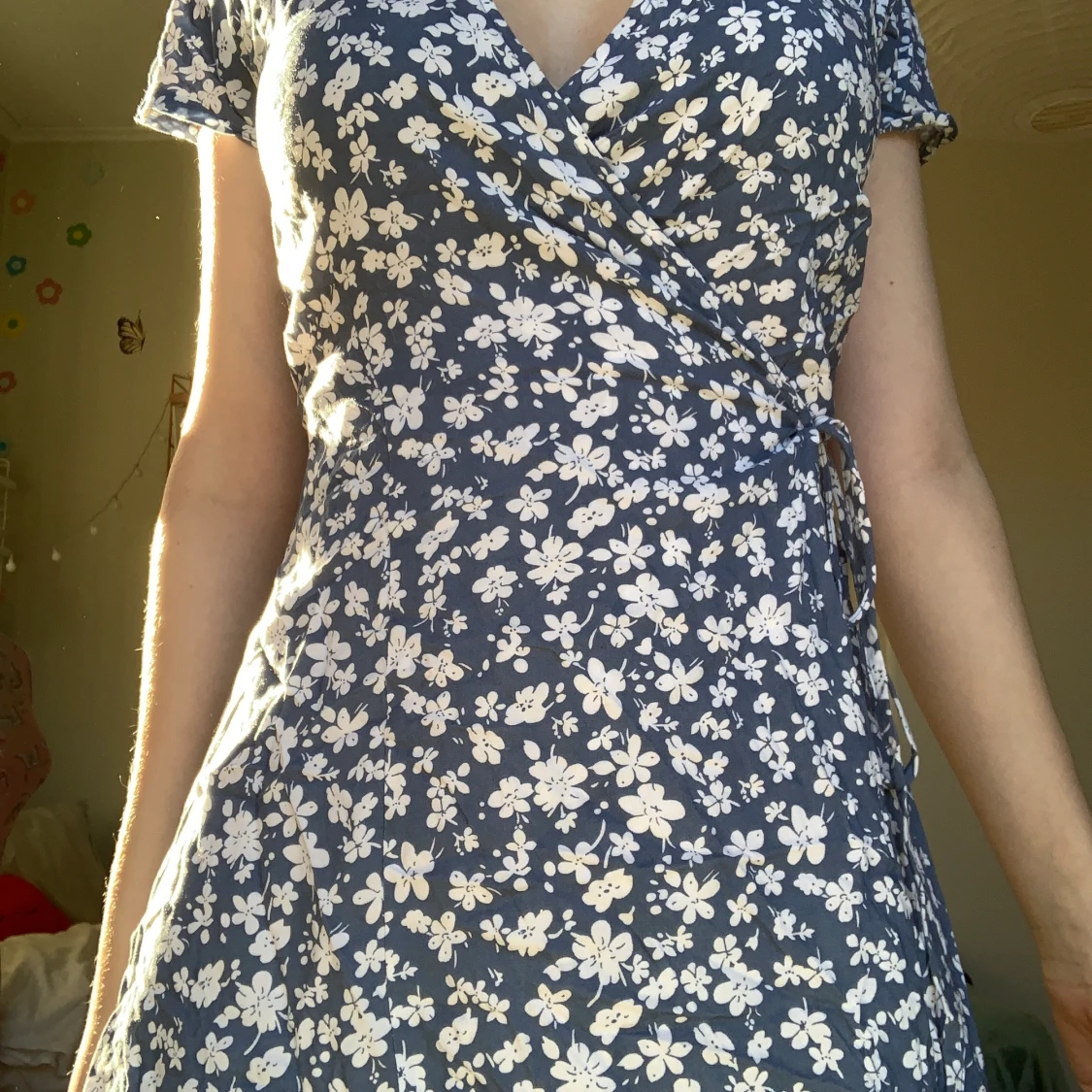 Blå omlottklänningen 