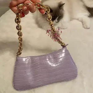 Pastell-lila väska ifrån Zara. 