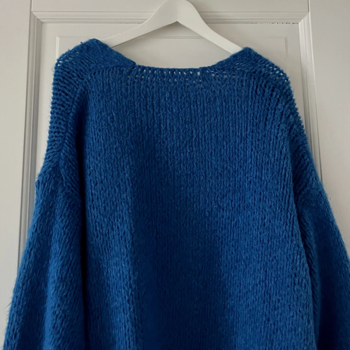 Blå stickad kofta  - 91