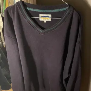 Vintage v-neck sweater barely worn. size XL send message for more pics :)