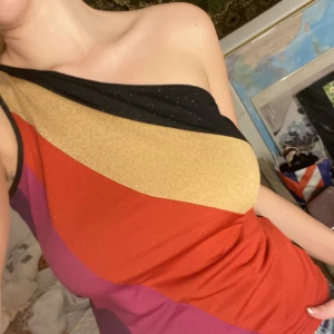 Disco topp - Super fin top med glitter i fina färger. Står storlek L men passar även M 