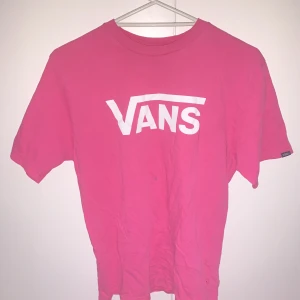 Vans Pink T-Shirt - Baggy Fit has one small hole on the side of it but nothing big. 