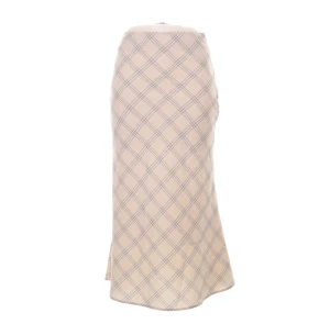 Rutig kjol - Rutig kjol från NA-KD. Storlek 34. Skulle säga att den är lång/midi kjol beroende på hur lång du är.  Nyskick.  Köpare står för frakt :)