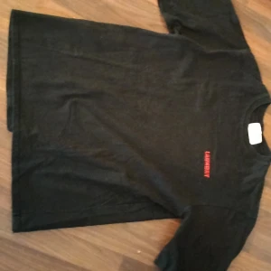 Laundry shirt - Haha moment.  Loose fitting.   I am 178cm tall and 76kg