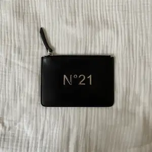 Small black leather №21 pouch that can be used as a card holder or a coin purse 18,5x13 cm