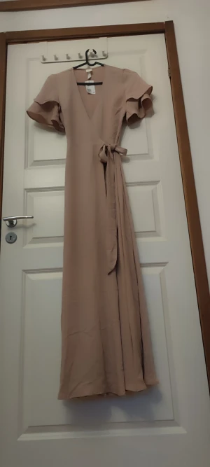 Klänning  - H&M storlek 34, Ny. 