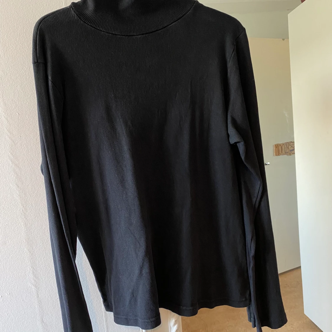 Svart turtleneck