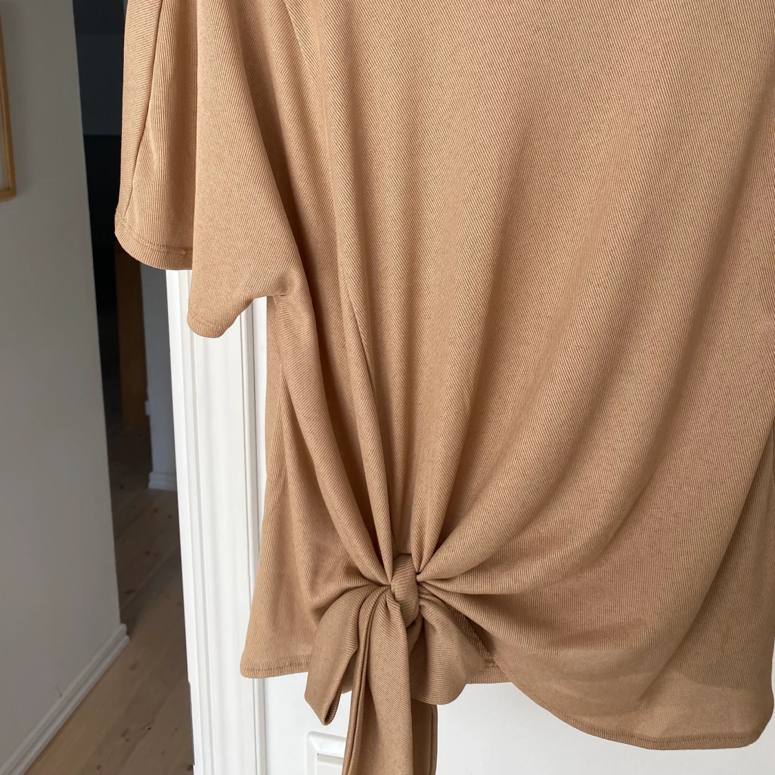 Beige tröja med rosett - 90