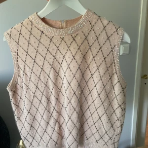 Väst - Köpt second hand, fint skick.