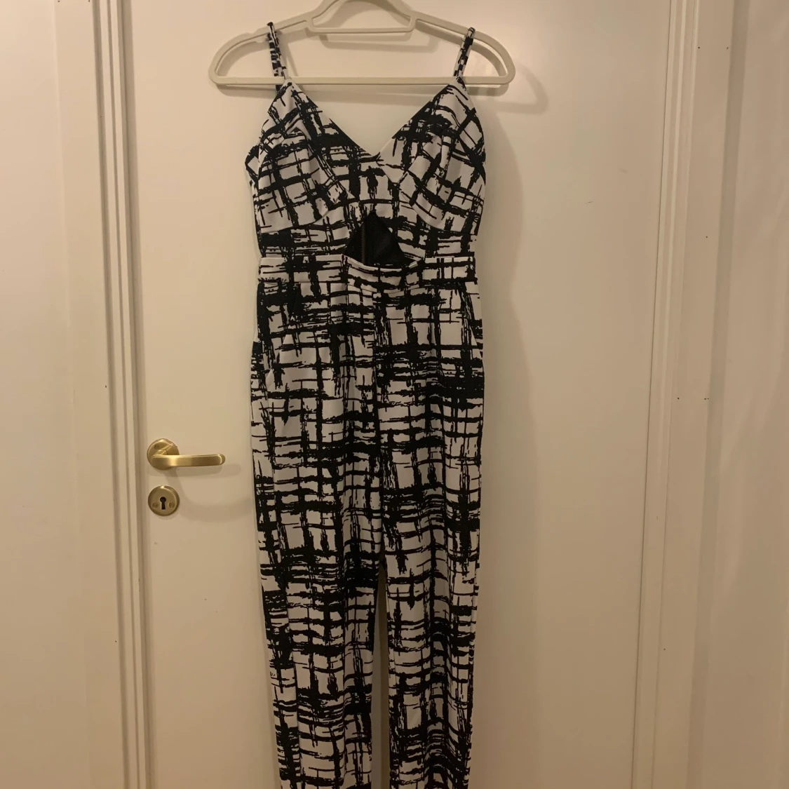 Byxdress svart vit storlek M