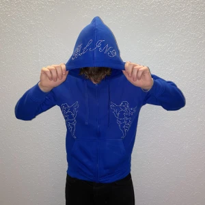 Blue Angel Hoodie  - Blå hoodie designat med Rhinestine, finns även i en svart modell!