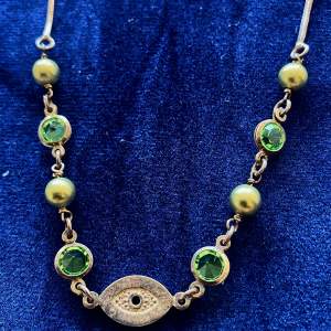 Vackert halsband med gröna rhinestones och allseende öga  Stämplat 925