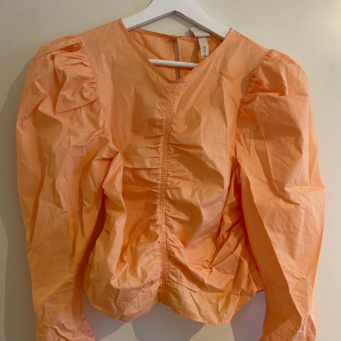 Organge blus från HM