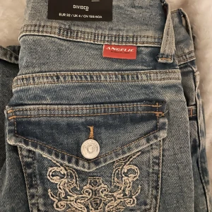 Flare low jeans  - Stolek 32💗