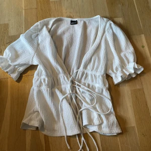 Topp - Jätte fin topp från Gina strl xs, nyskick. 